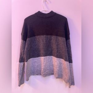 Elegant smock neck sweater with colour block stripes